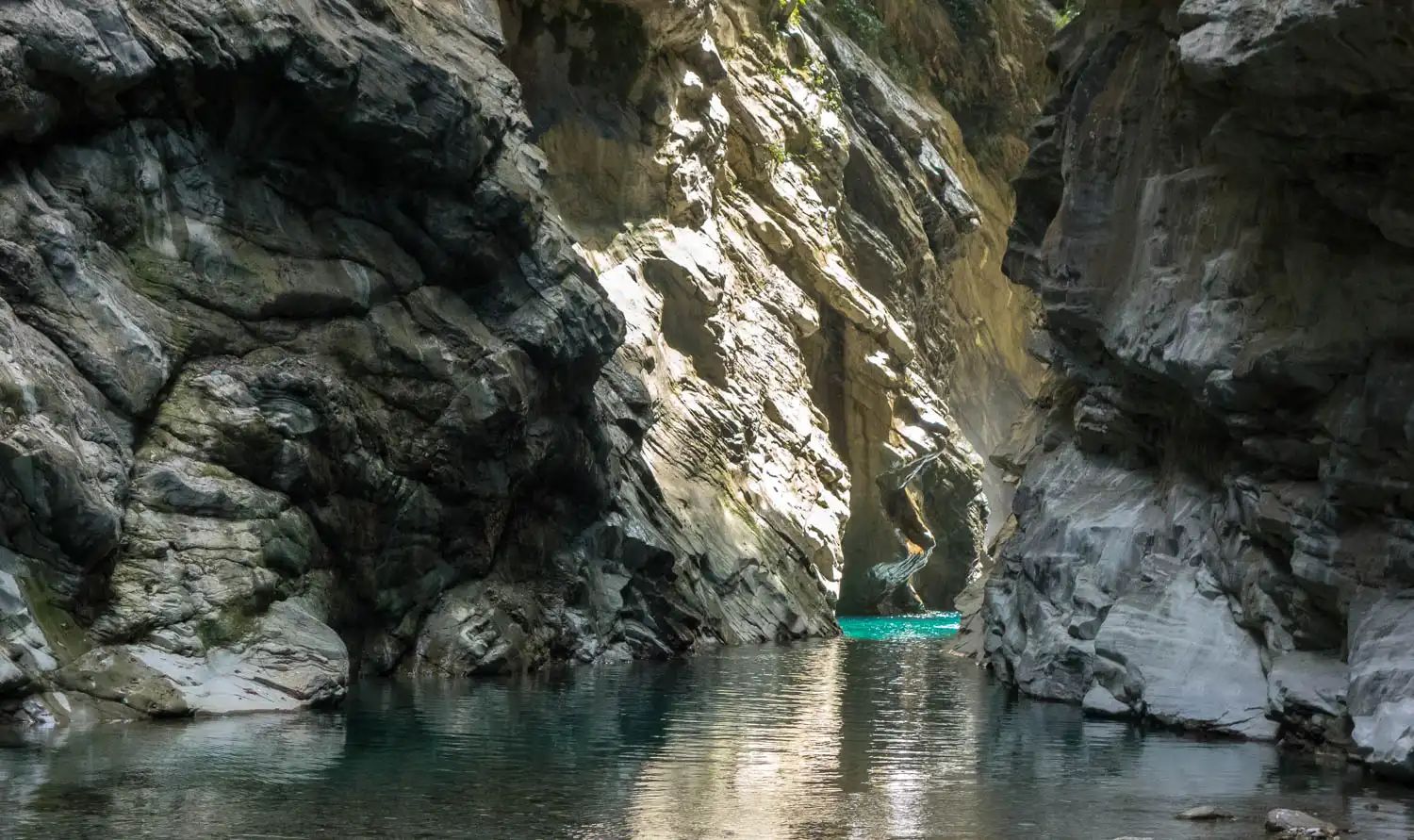 long gorge illuminated partially by sunlight
